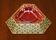 Antique Persian ashtray with triangular glass tray.