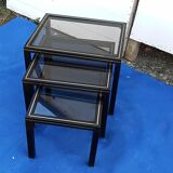 Black nesting tables by Pierre Vandel