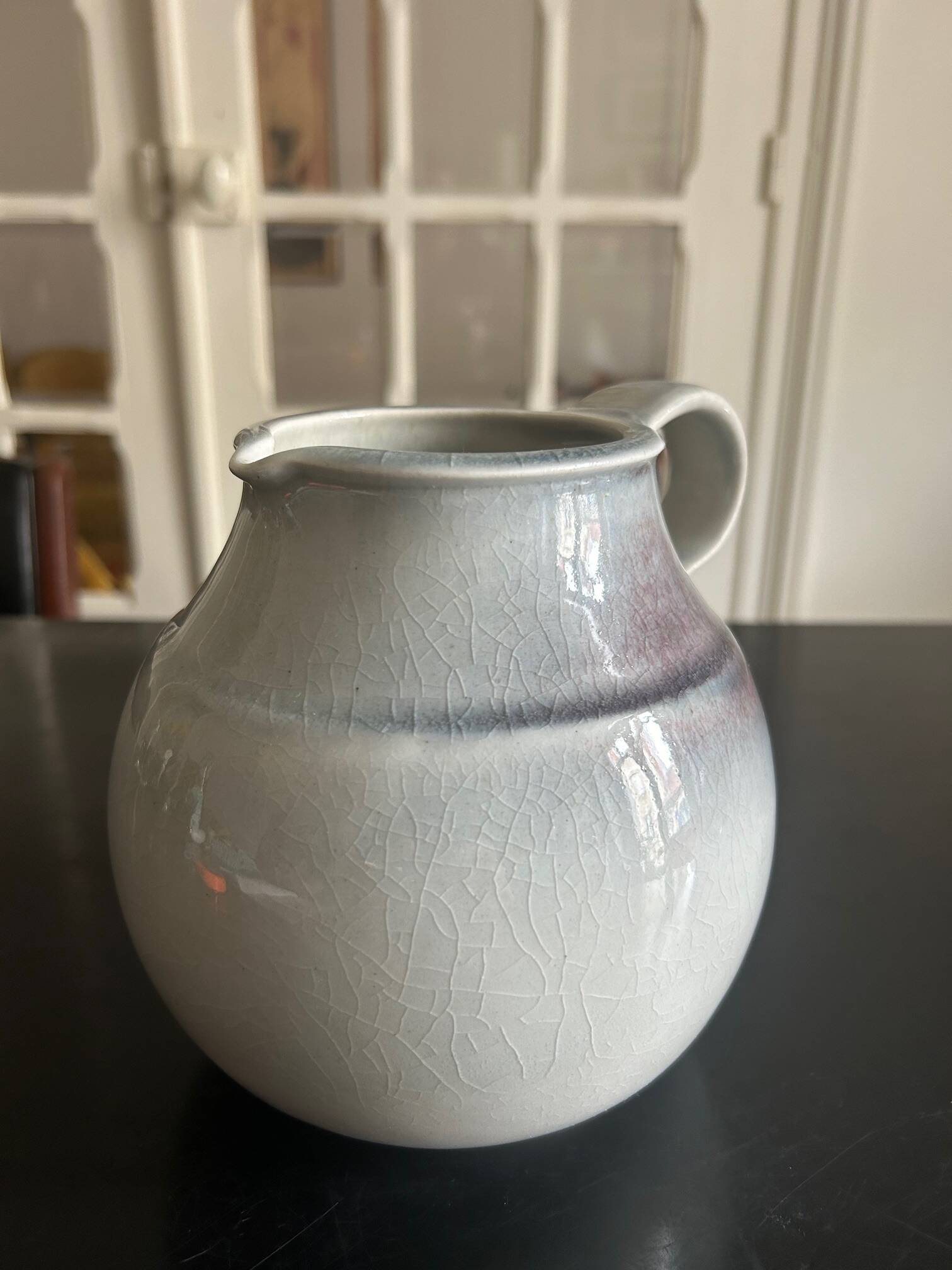 large blue ceramic pitcher