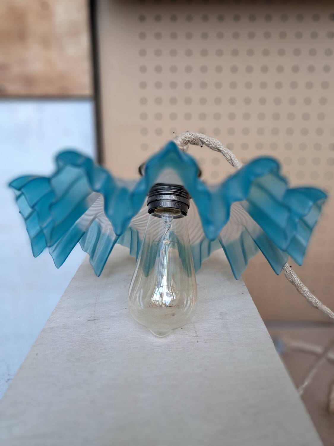 Blue draped suspension