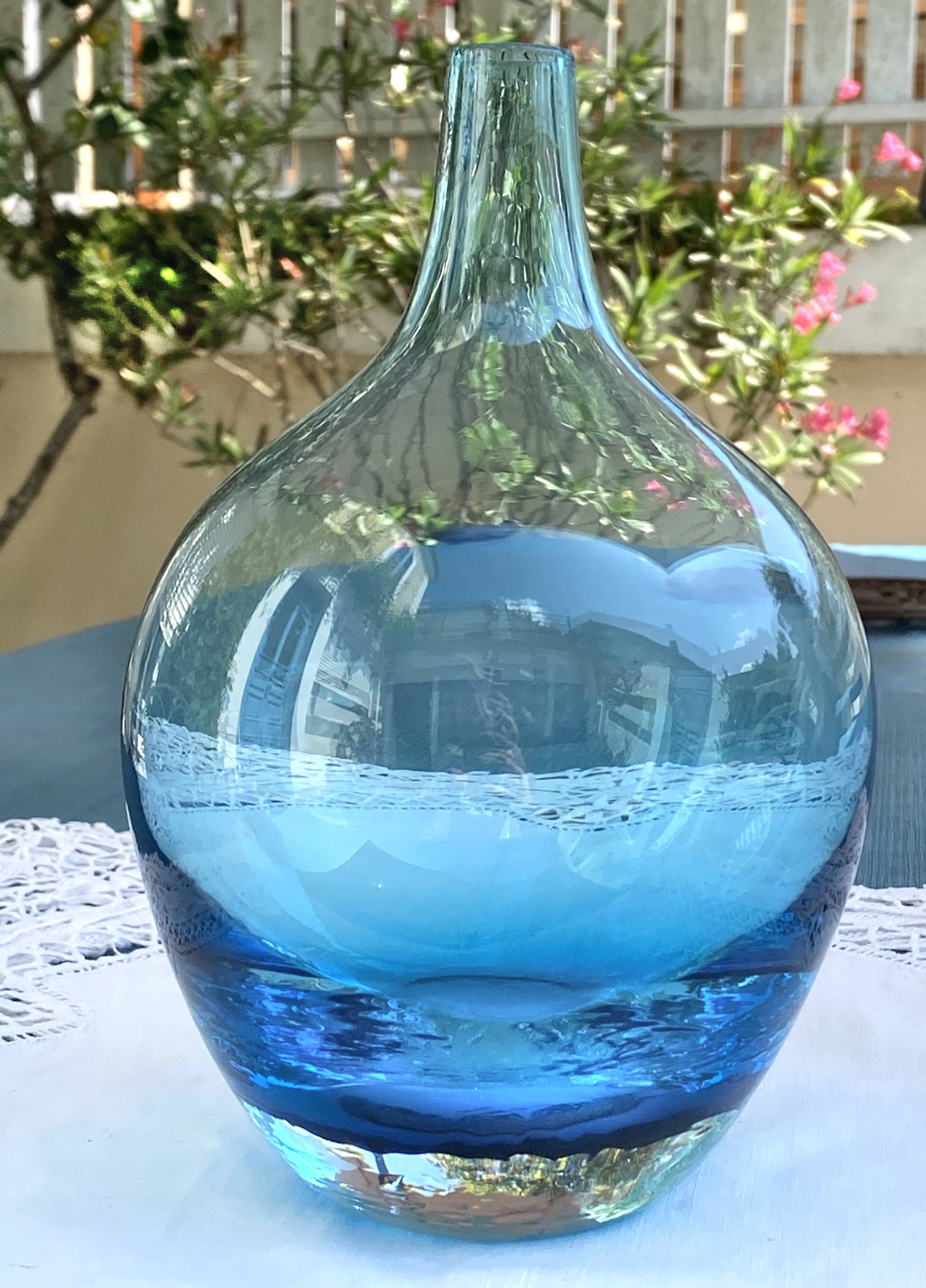 Vintage handmade aqua blue glass bud vase from the 1990s