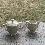 Antique porcelain sugar bowl and milk jug from the Royal Factory of Limoges, France