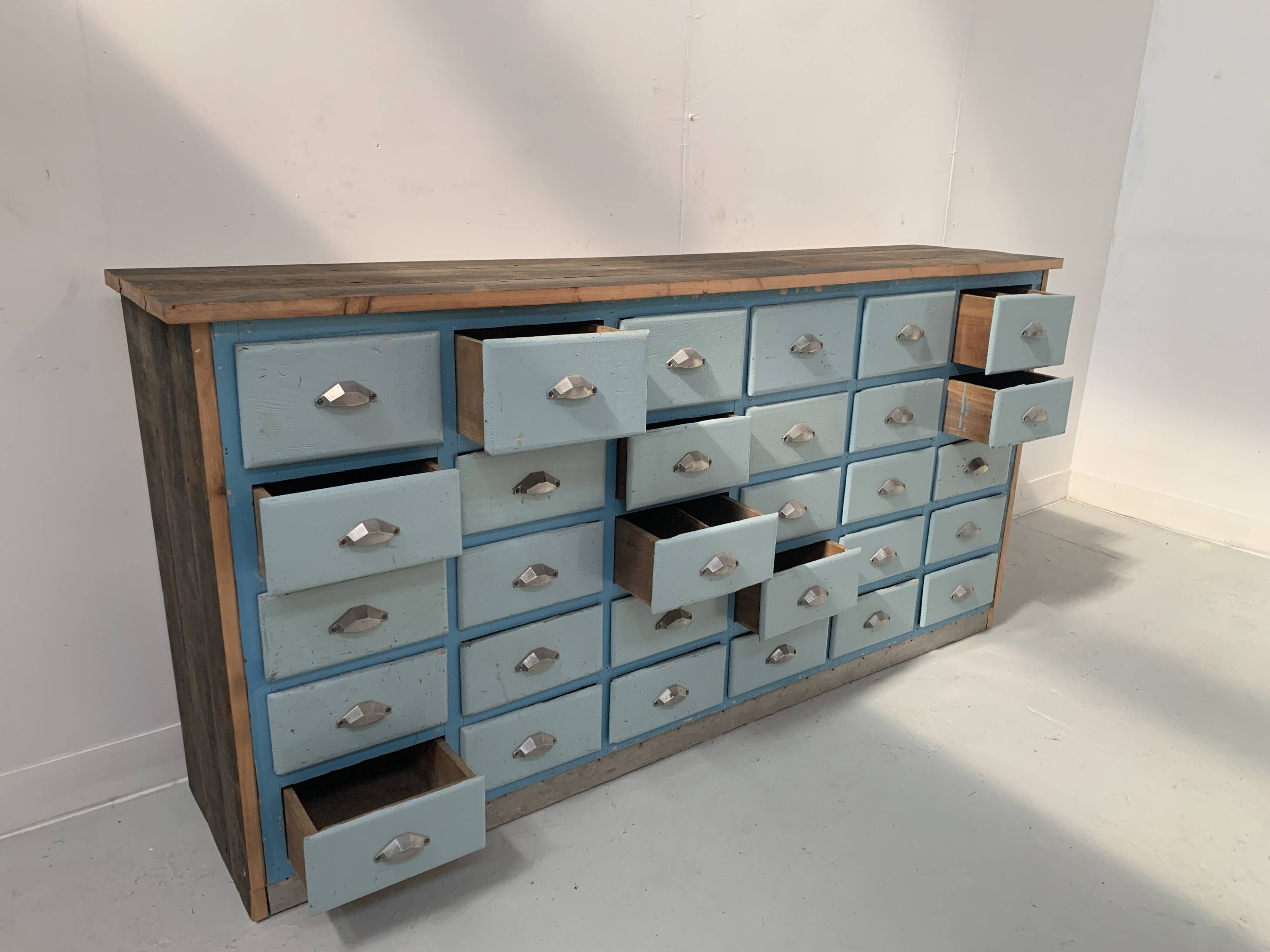 30-drawer storage unit in patinated fir, 20th century