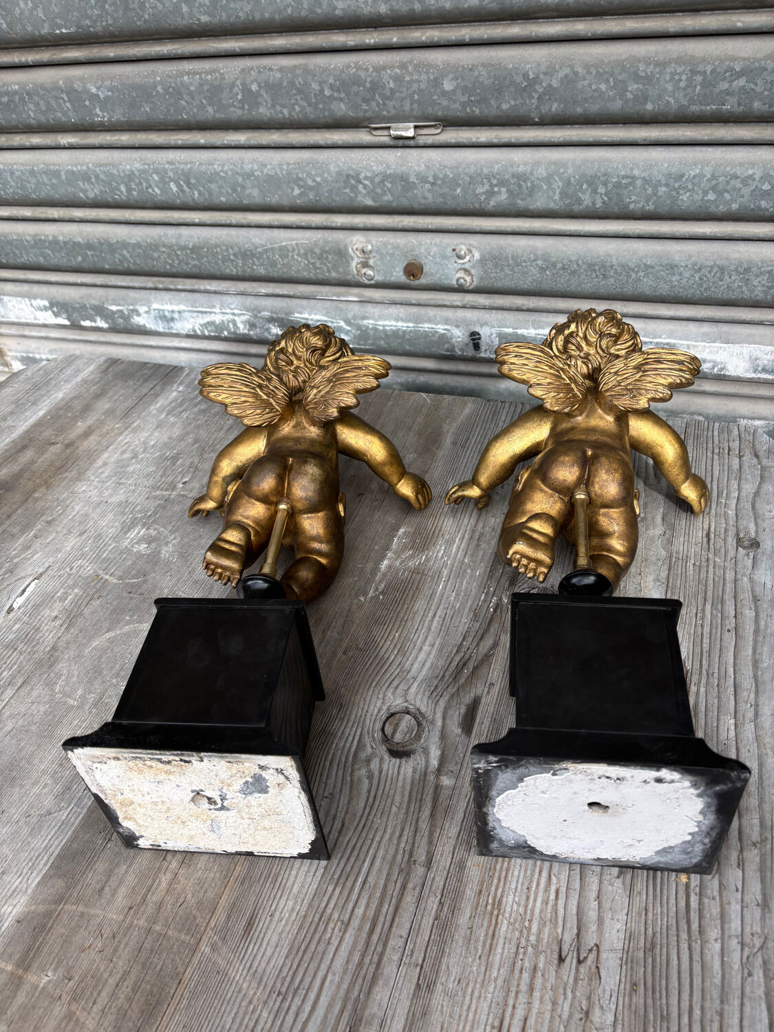 Pair of gilded cherubs on a Napoléon III base
