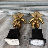 Pair of gilded cherubs on a Napoléon III base