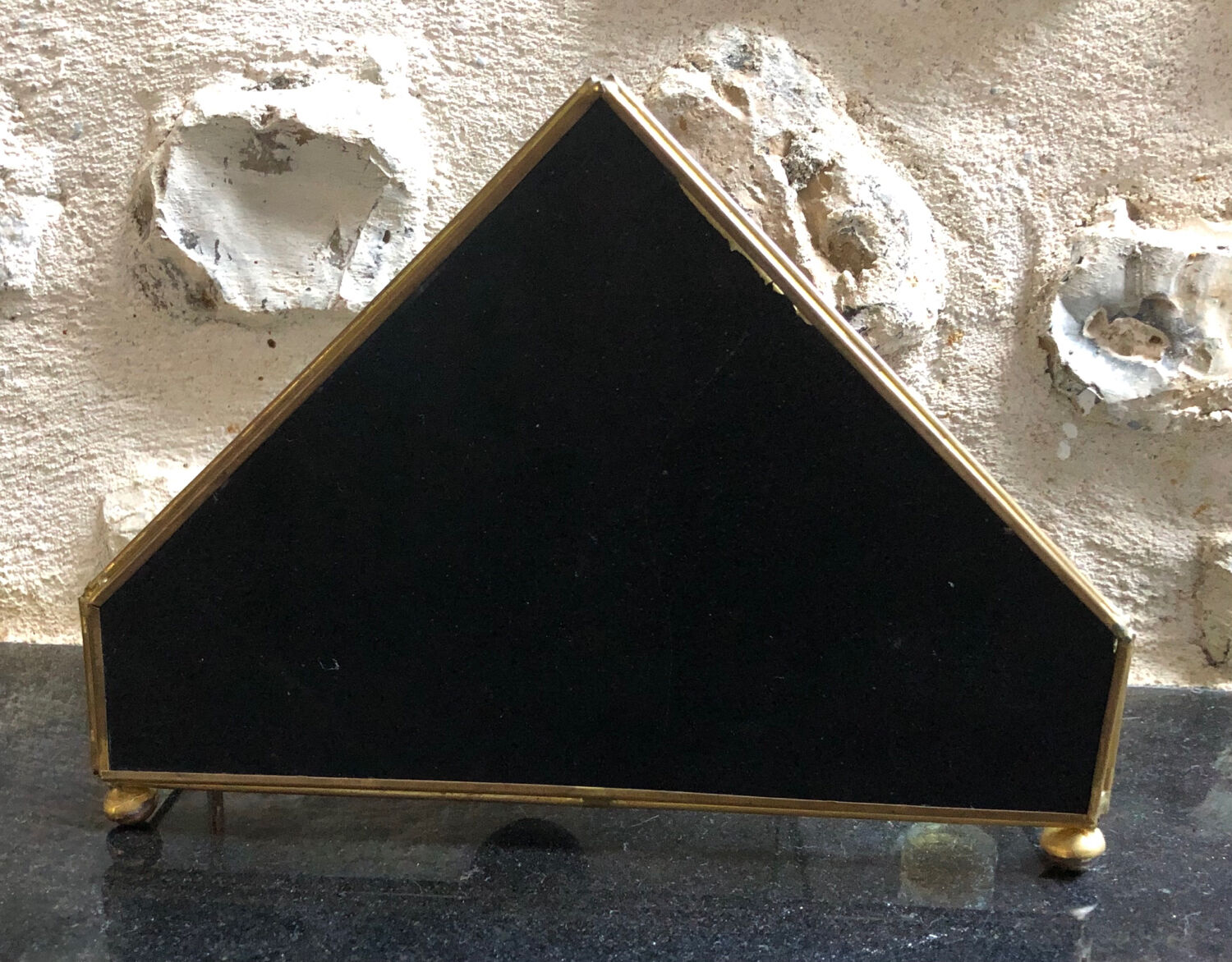 Vintage showcase, glass and brass for collectibles.