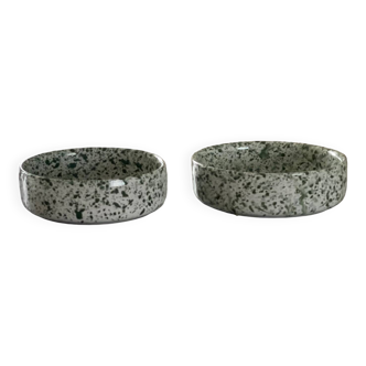 2 green speckled ramekins.