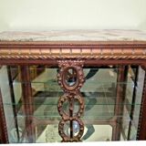 A Louis XV style display cabinet with three beechwood shelves and a white marble top.
