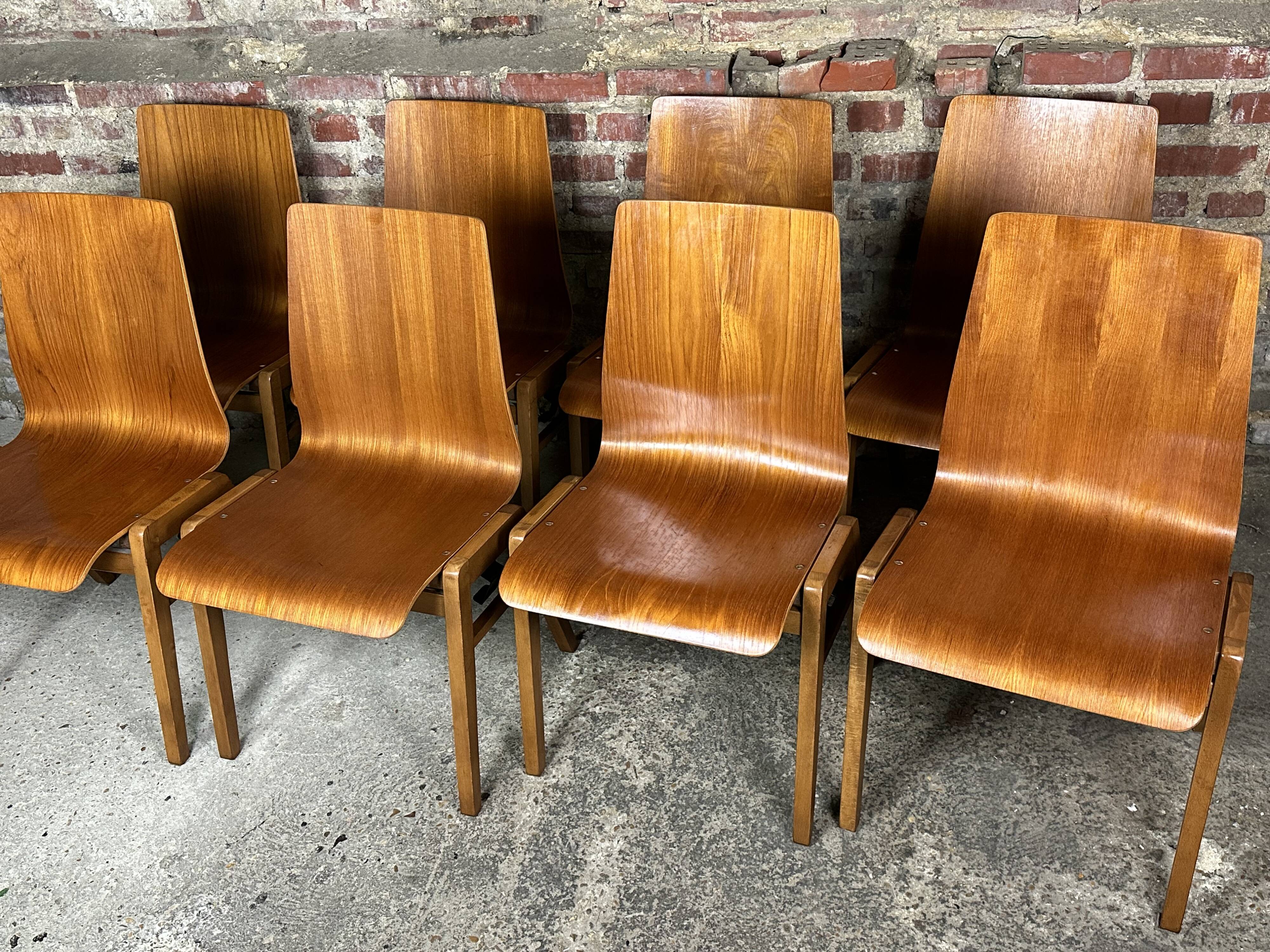 Scandinavian chairs (set of 8) in thermoformed beech from the 1960s.