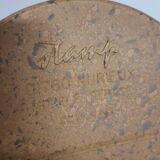 Bucket has champagne shape field cap