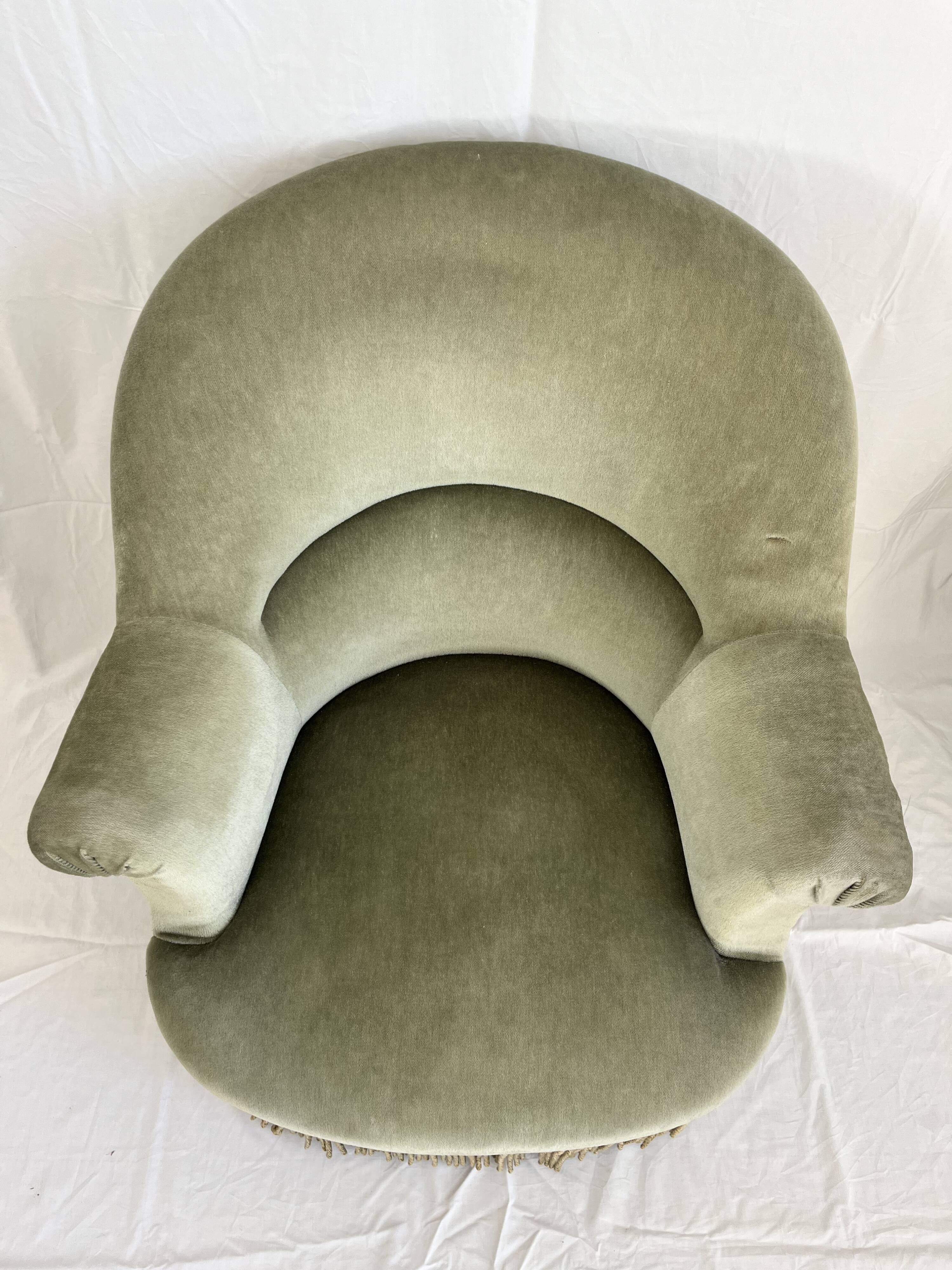 sage green toad armchairs with gold fringe