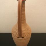 Vintage glass and rattan bottle