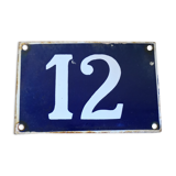 Old enameled plate number of street