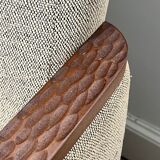 Pair of armchairs in carved wood and vintage fabric