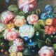 Still life with roses in a beautiful frame on a wooden panel in Flemish style.