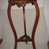 Harness plant dating back to early 20th end table wooden