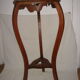 Harness plant dating back to early 20th end table wooden
