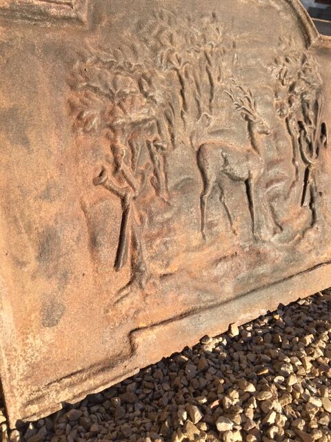 Cast iron fireplace decoration in Relief Deer in good state forest