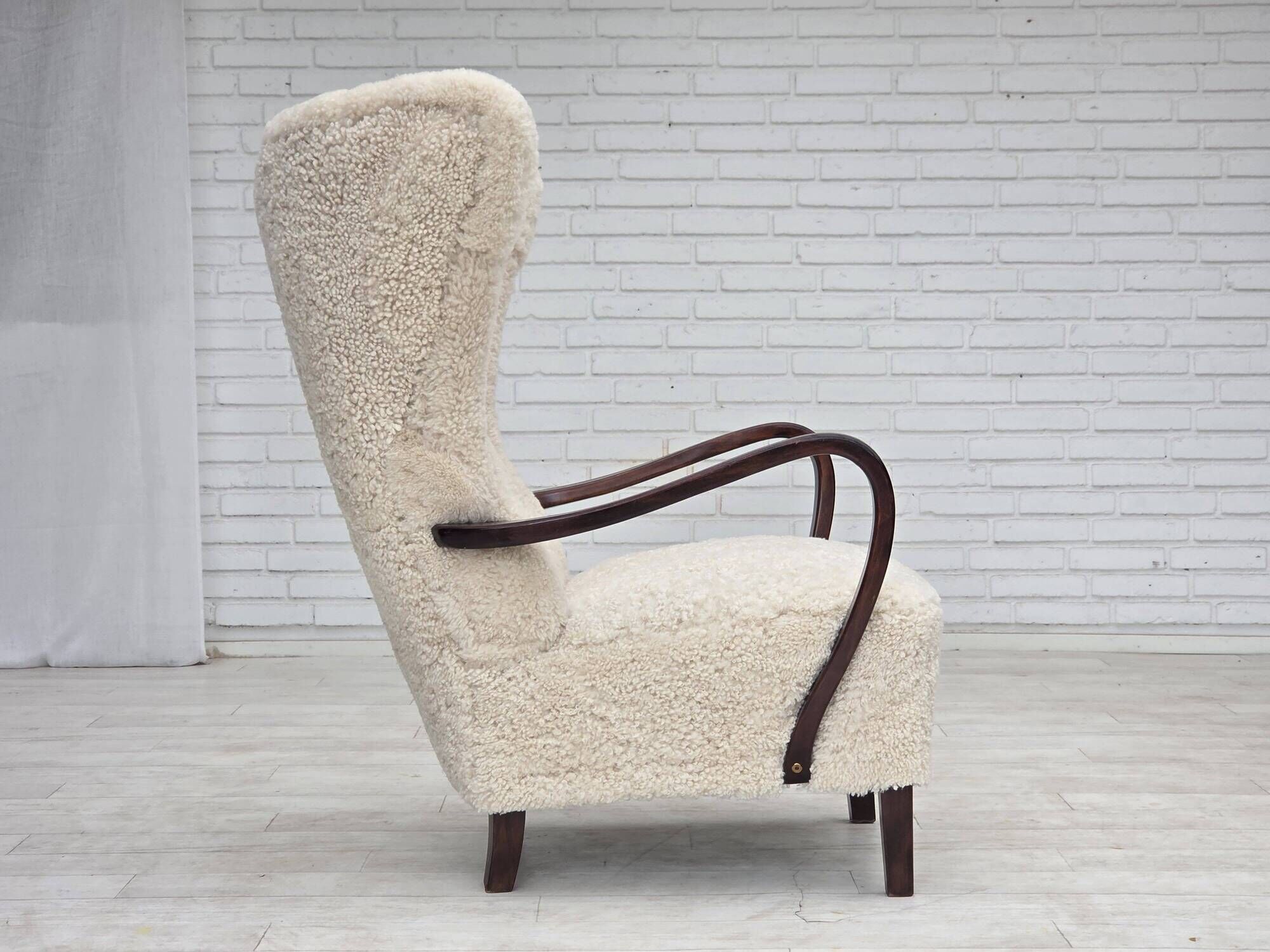 1960s, Danish high-back armchair, genuine sheepskin, reupholstered.