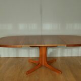 Oval walnut table with extension cords