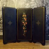 Old fireplace screen in painted sheet metal