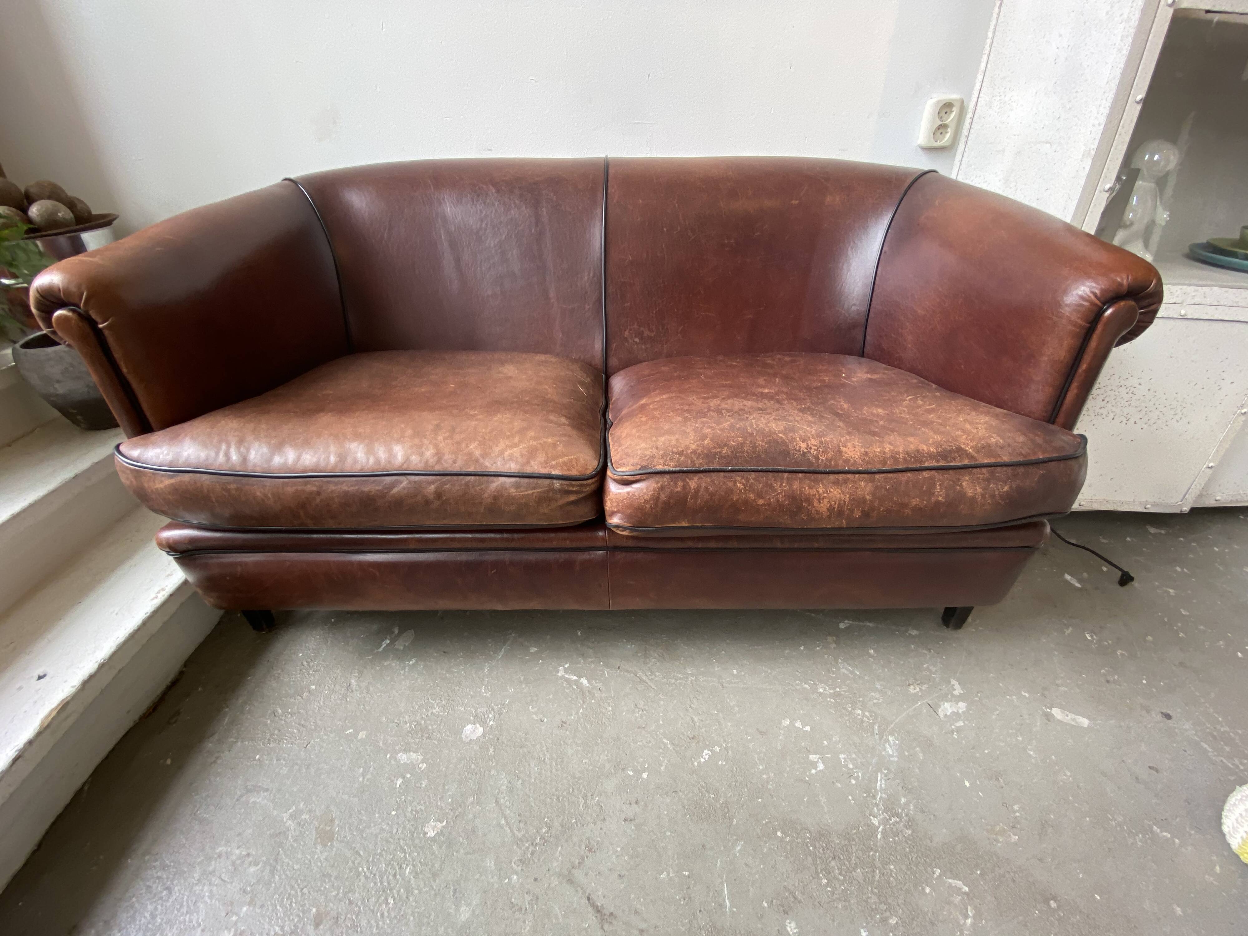 Canapé deux places vintage en cuir