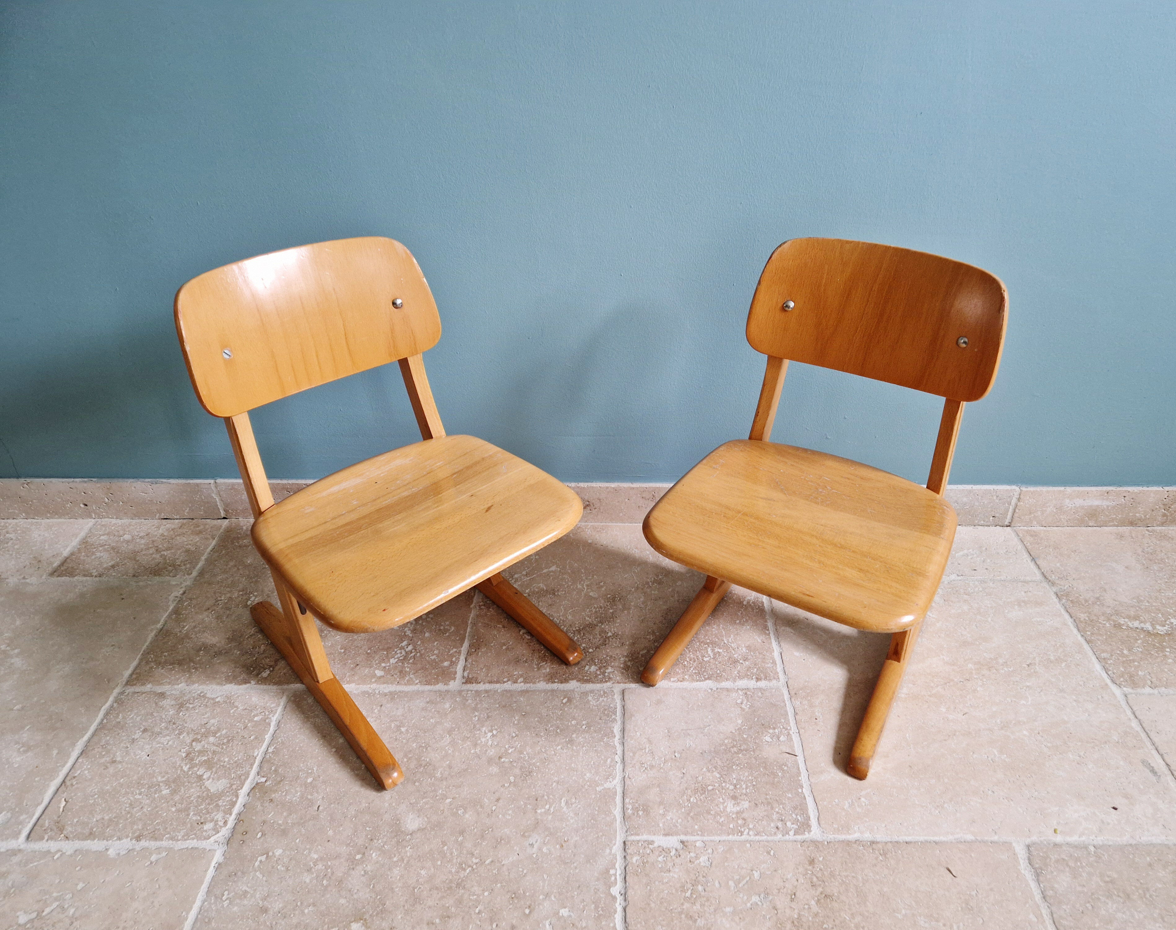 Pair of children's chairs by Casala in solid beech, 1960s.