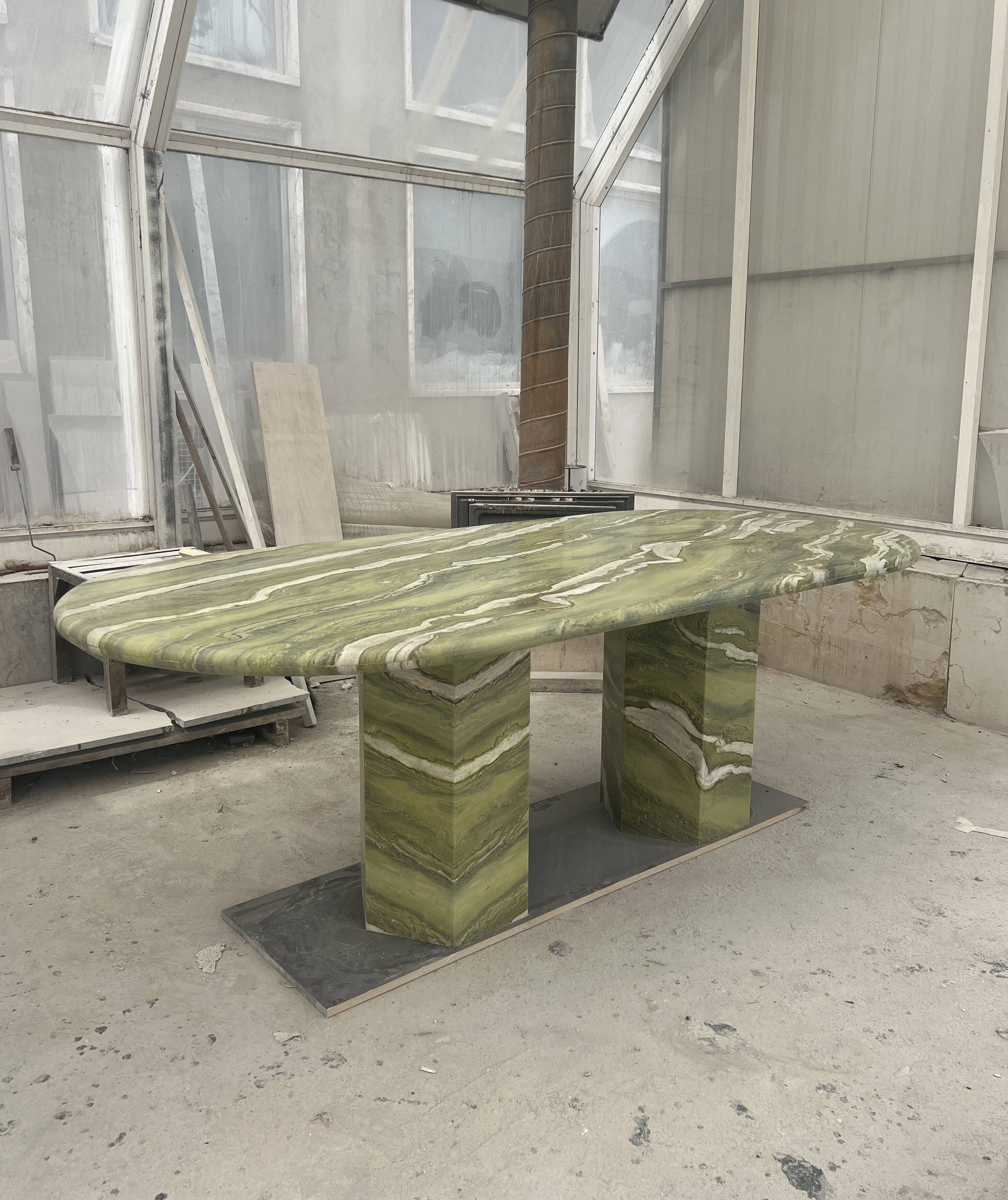 Large green marble oval dining table by my habitat design
