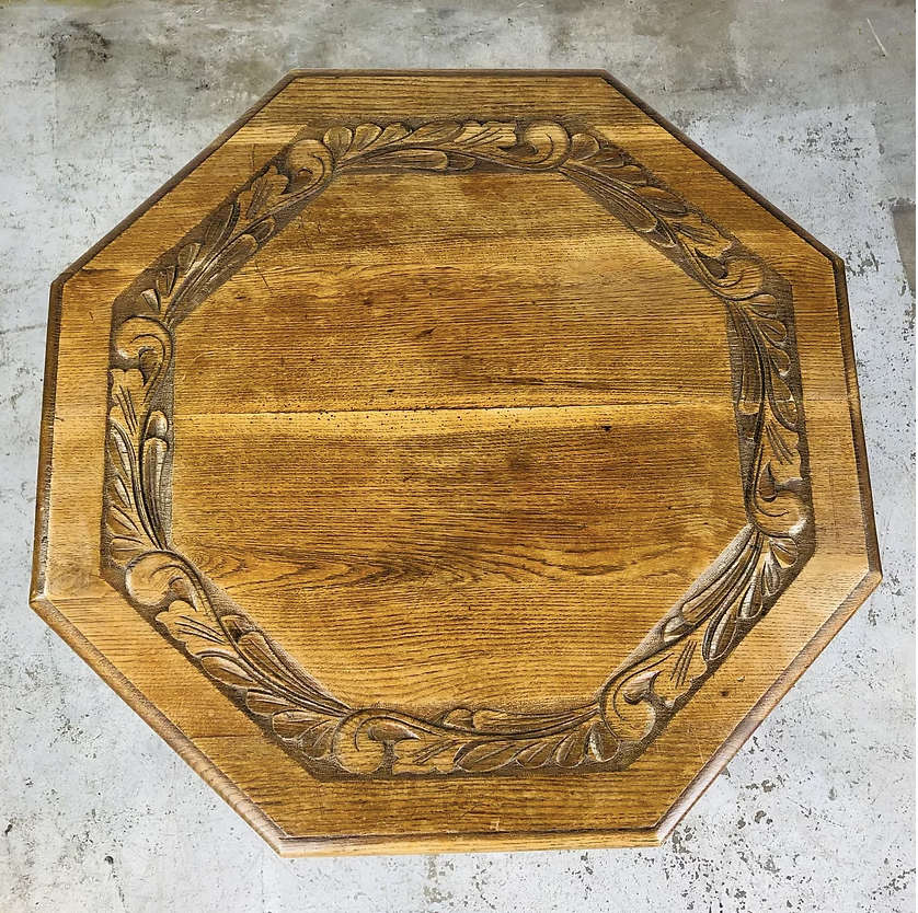 Carved antique wooden table with 8 sides