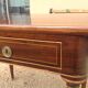Louis XVI style table in rosewood with lemon tree inlay.