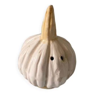 Garlic-shaped salt shaker in vintage slip