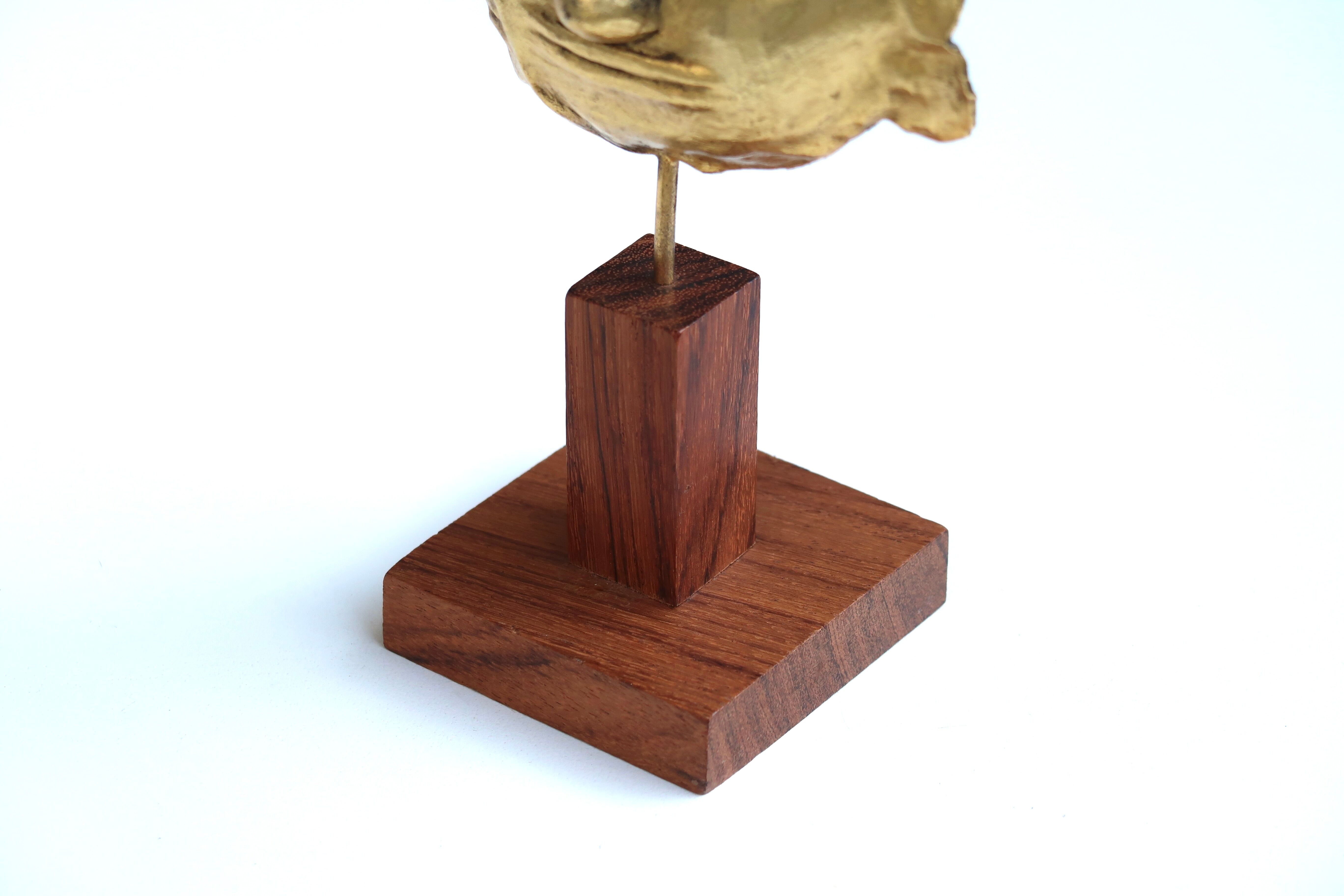 Mayan mask sculpture in gilded metal, 70 cm