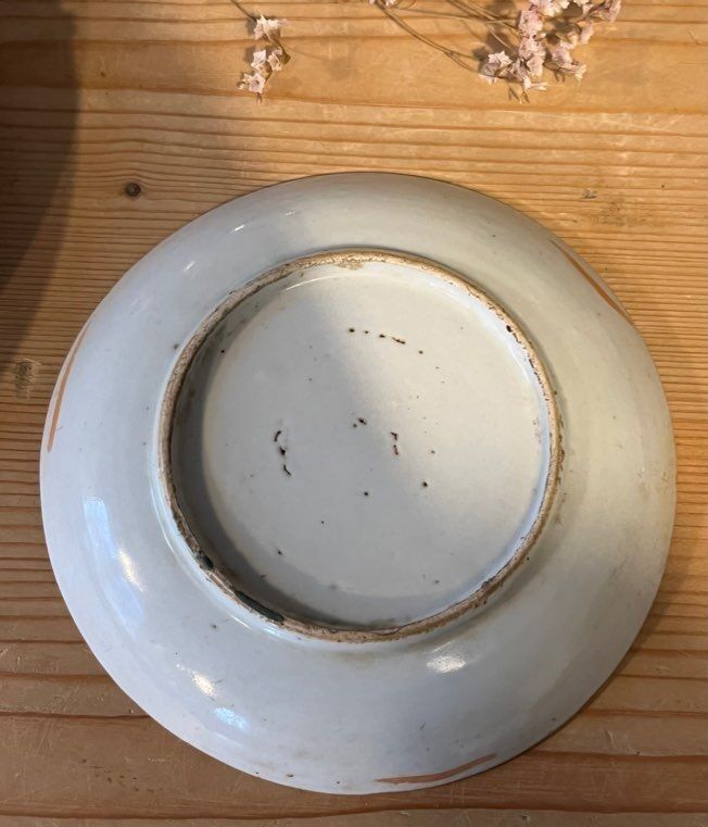 Ceramic cup with floral motif