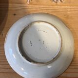 Ceramic cup with floral motif