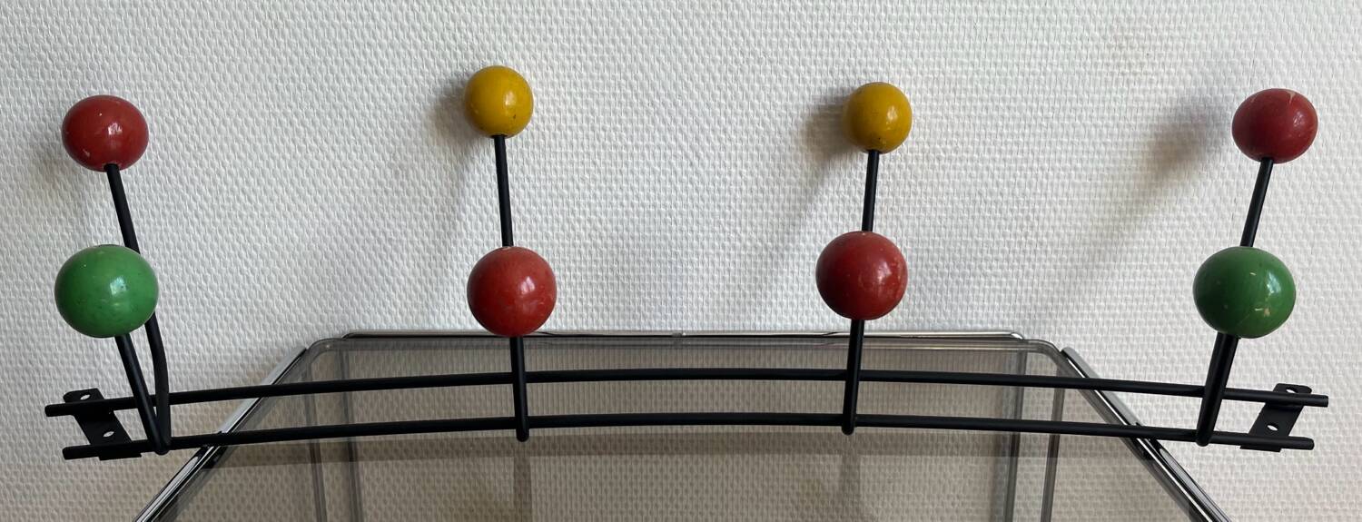 Iron wall coat rack and wooden hooks from the 60s