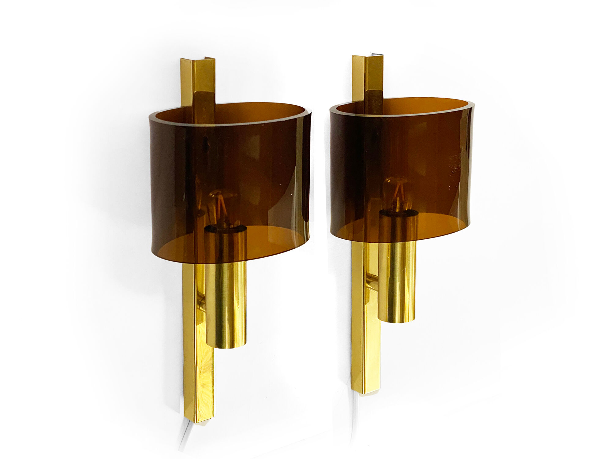 Pair of brass sconces with toned plastic shades, Denmark 1970s