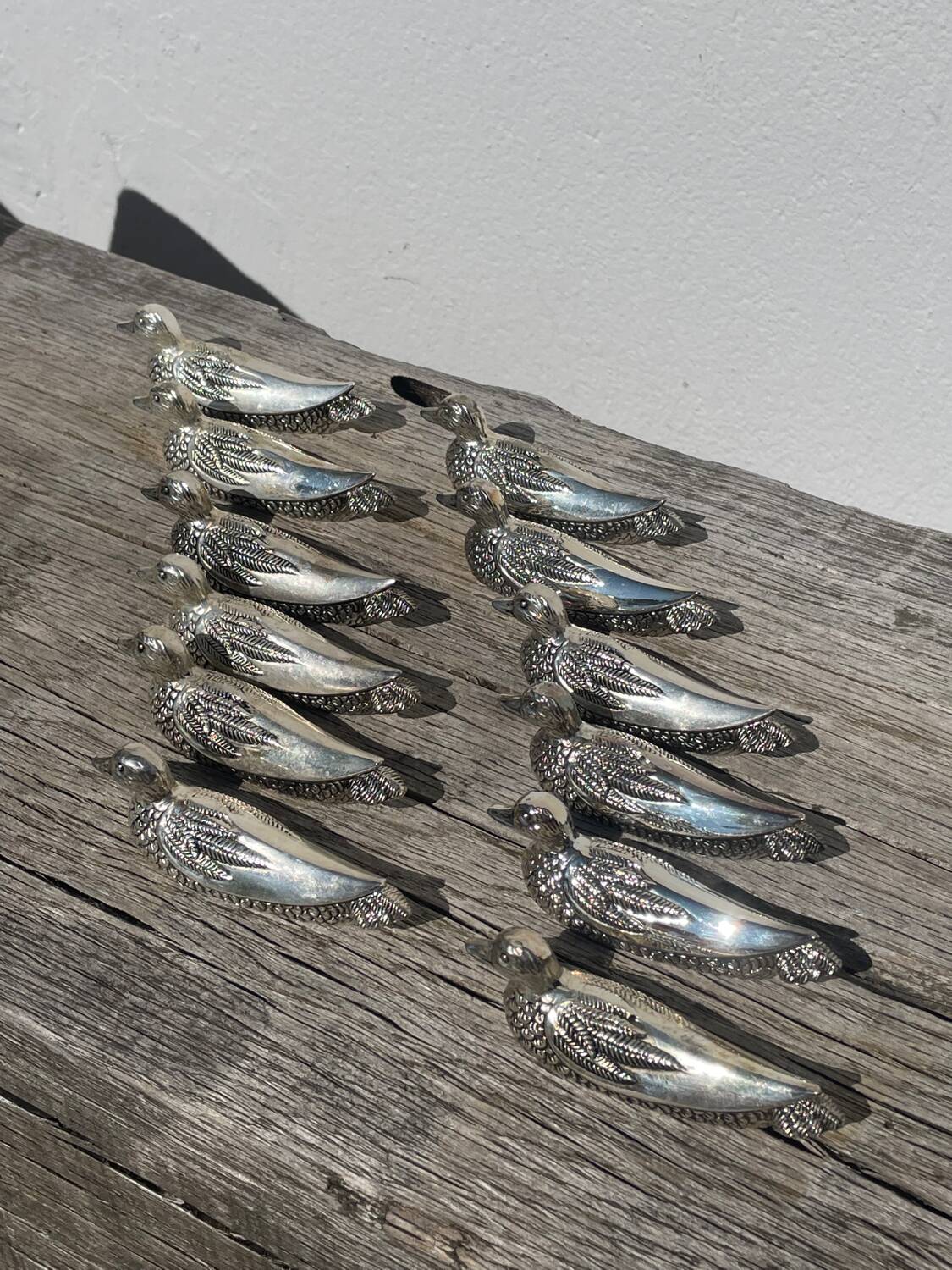 12 silver metal duck knife rests
