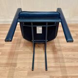 Set of 3 leather and metal armchairs.