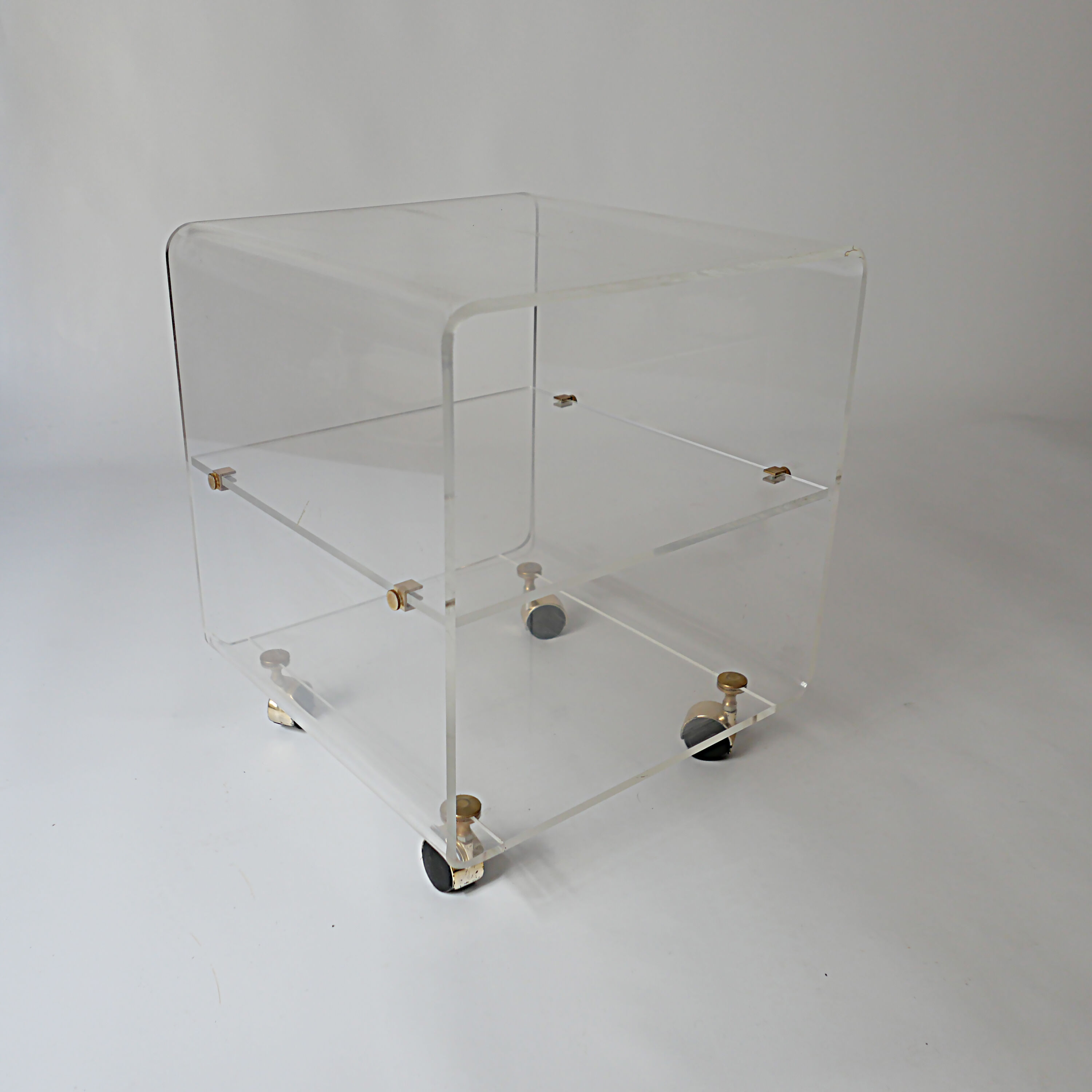side table on wheels in plexiglass designed by David Lange 1970