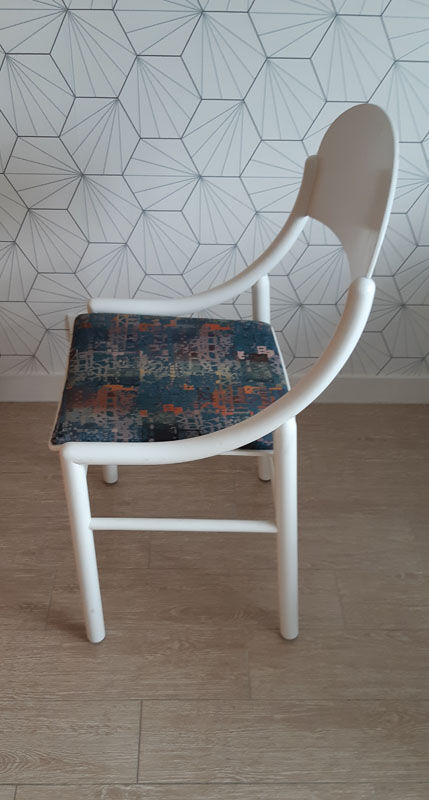 White Baumann chair.