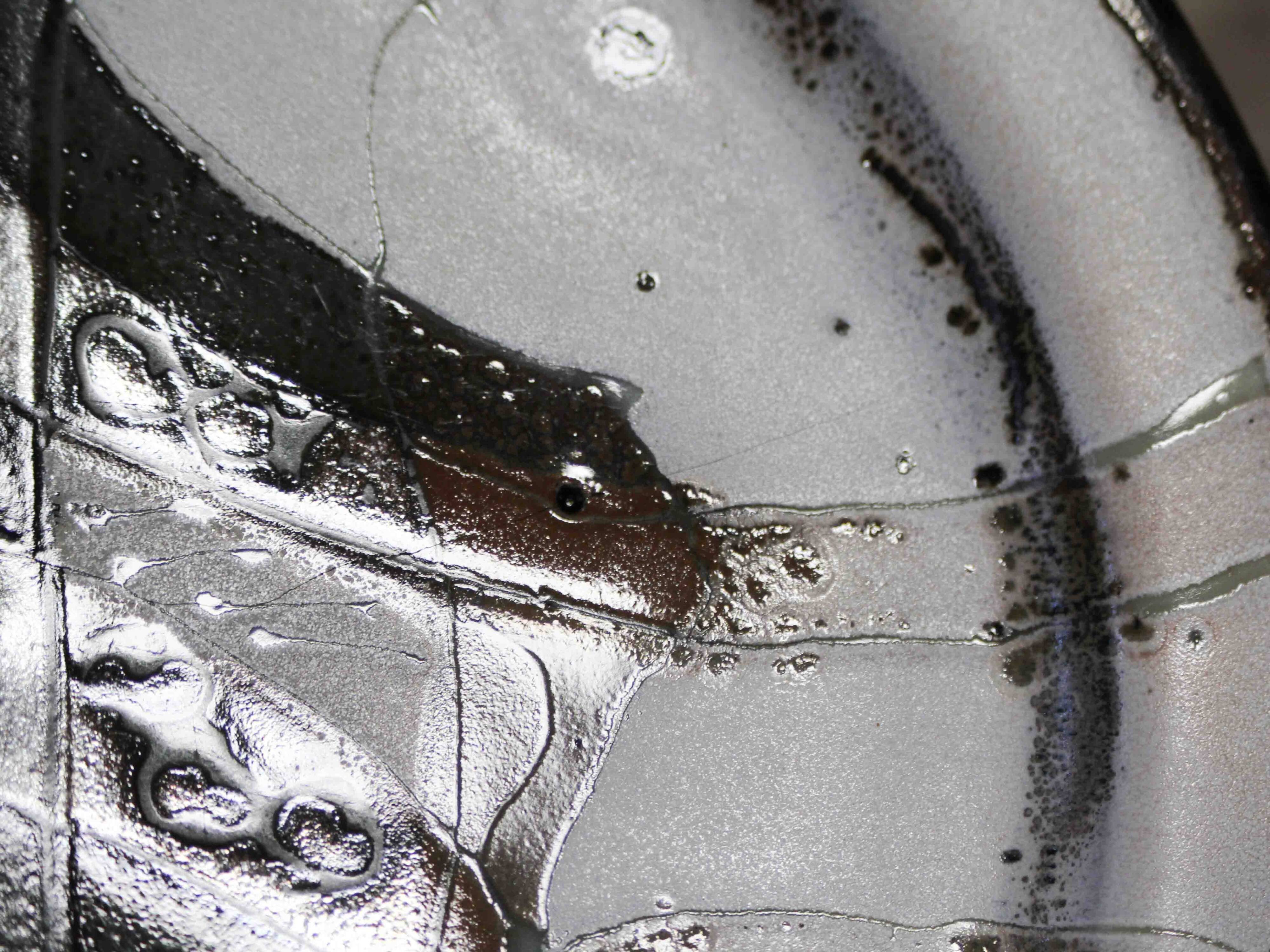 Decorative glazed stoneware plate by Patrick Rollet