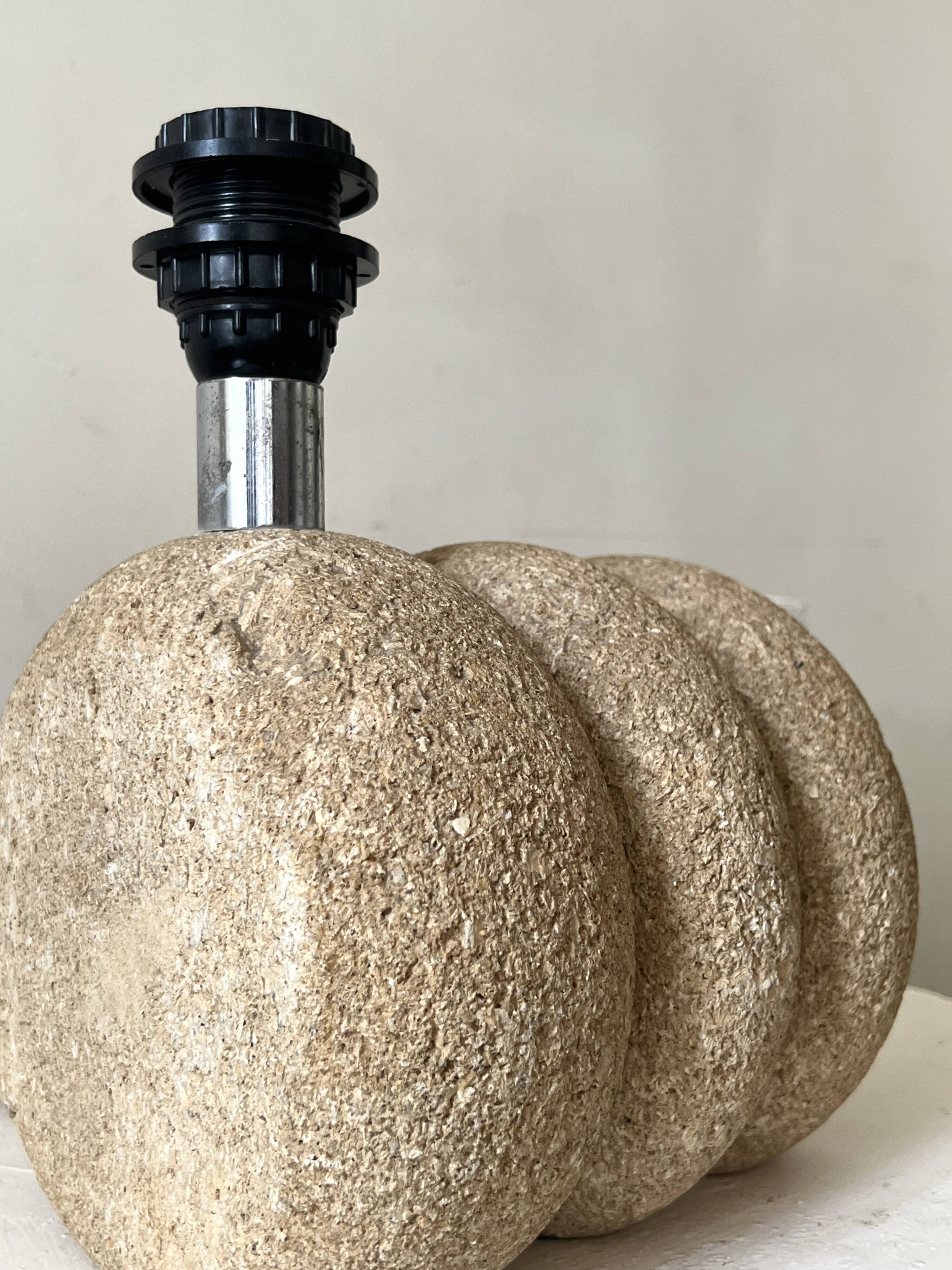 Sculptural lamp base in limestone by Albert Tormos or Fratelli.
