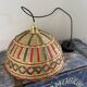 Vintage suspension in electrified braided wicker to nine