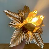 Vintage wall light in gold metal with leaf decorations