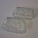 2 transparent glass ramekins with handles in very good condition.