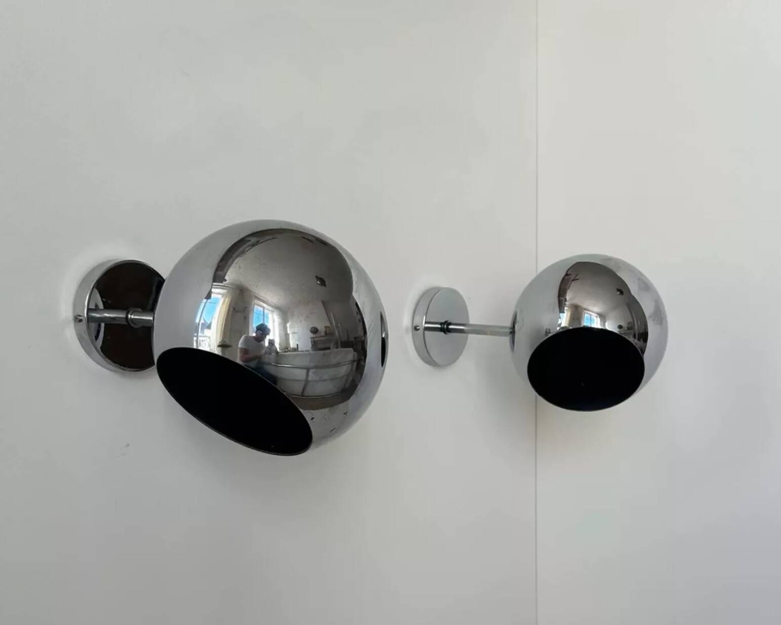 Pair of adjustable wall lights, chromed metal, France 1970