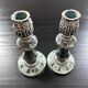 Pair of green ceramic candlesticks