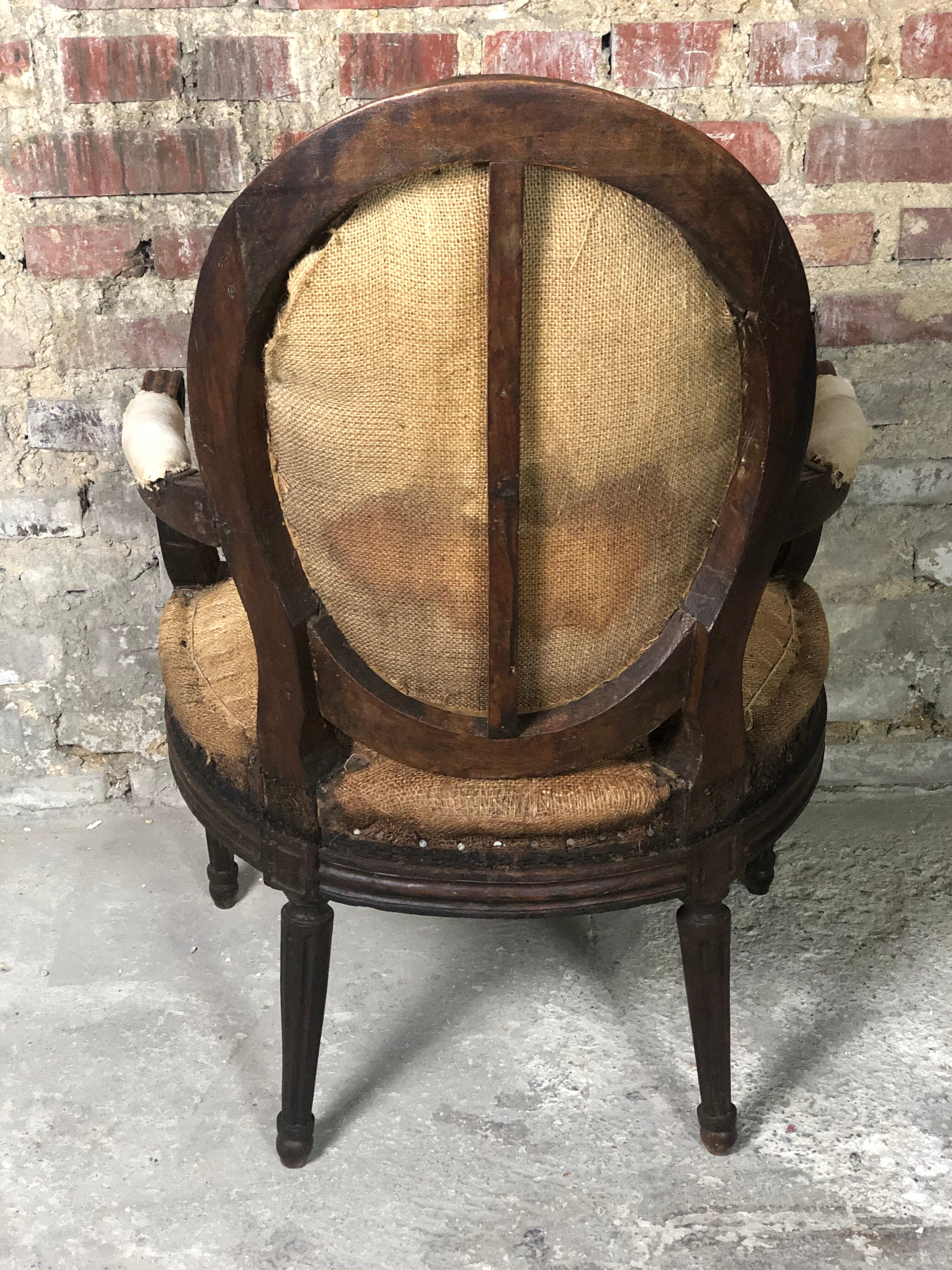 Louis XVI period medallion armchair