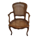 Cane armchair