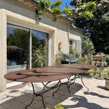 Artisanal wrought iron garden table